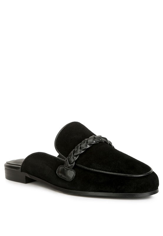 Black suede mule slides.
